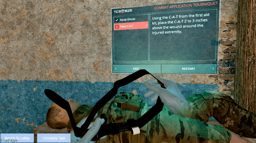 User's view from within the virtual reality TC3Sim tourniquet scenario. 