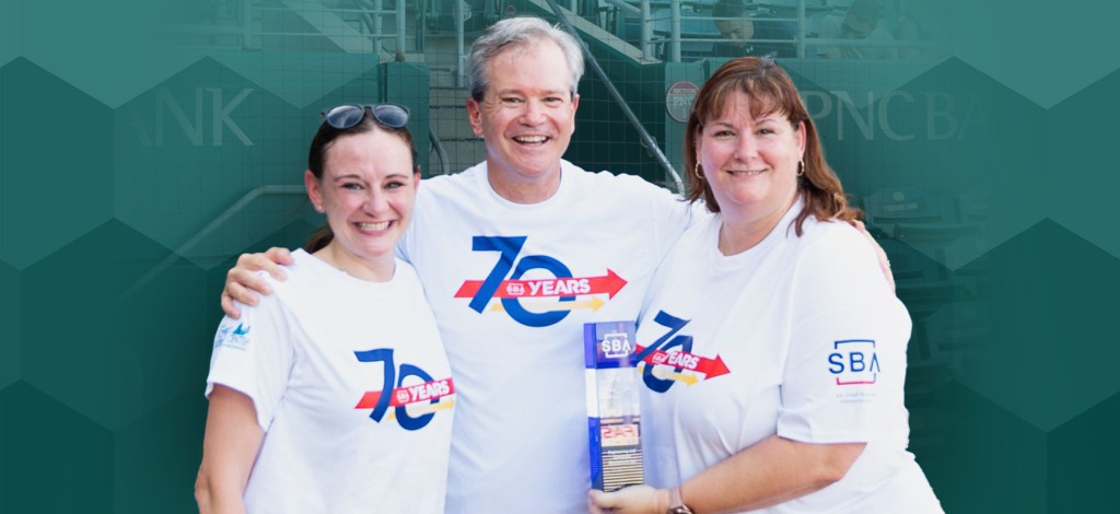 Waymon, Jonel, and Linda with award